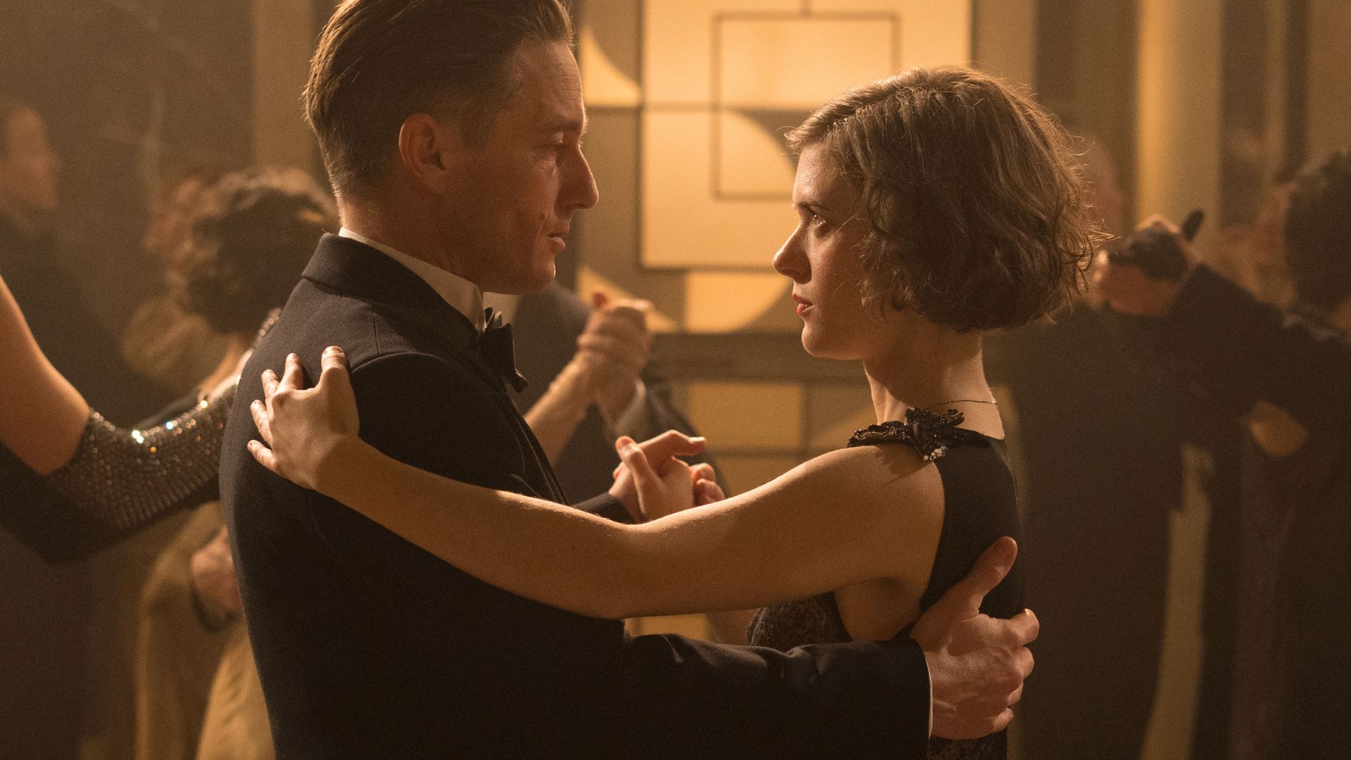 Volker Bruch as Gereon Rath and Liv Lisa Fries as Charlotte Ritter in BABYLON BERLIN Season 5.
